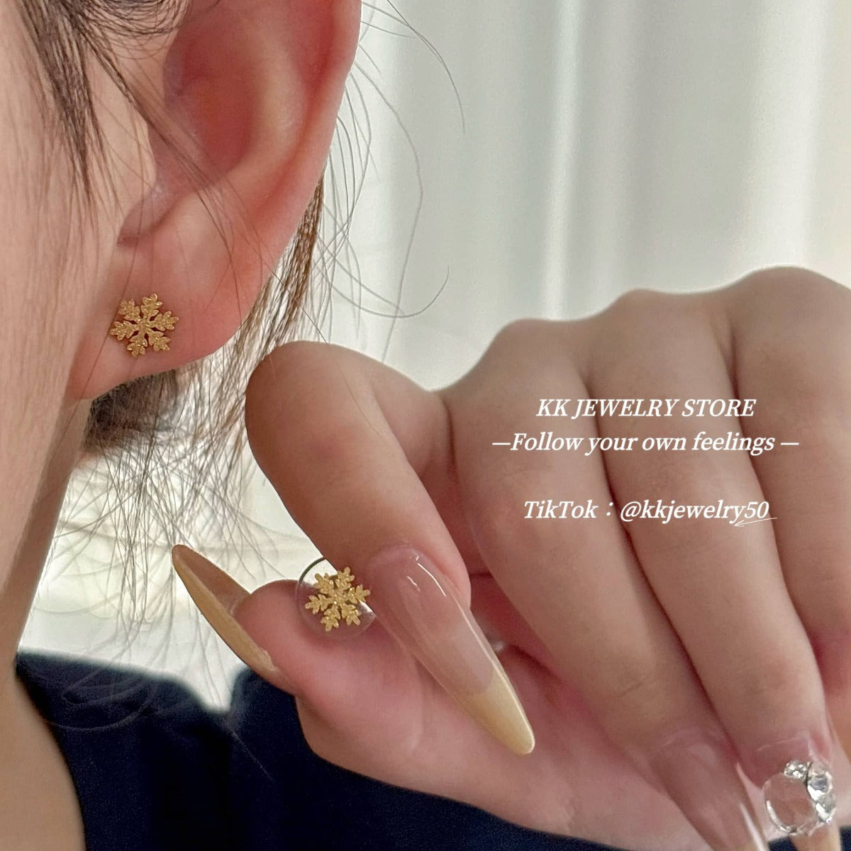 Two snowflake stud earrings