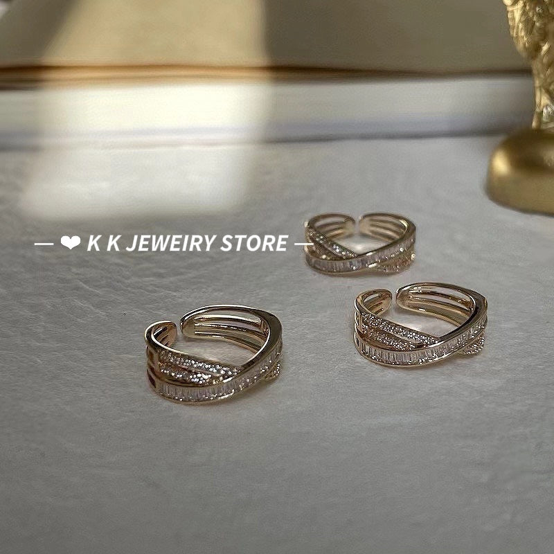 Cross-wrapped gold rings