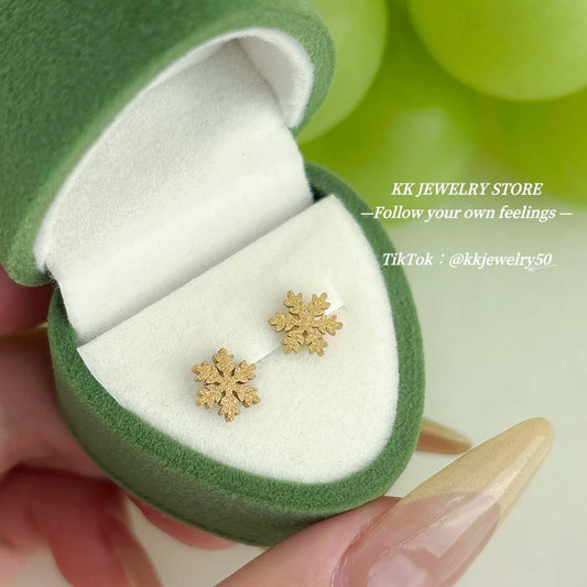 Two snowflake stud earrings