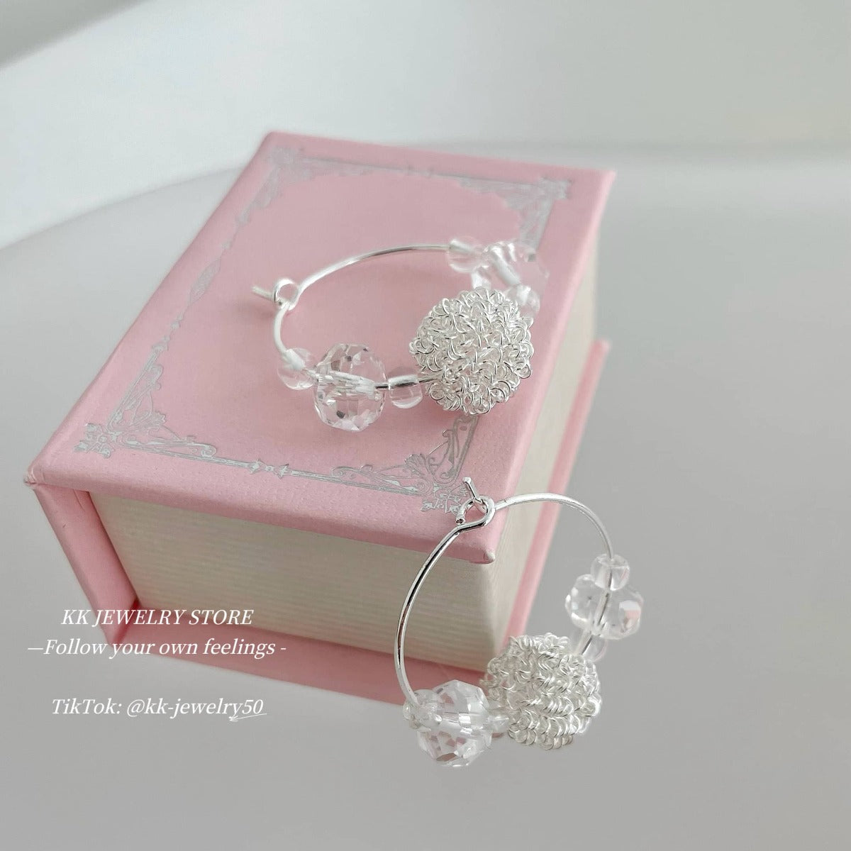 Transparent crystal steel wire ball earrings