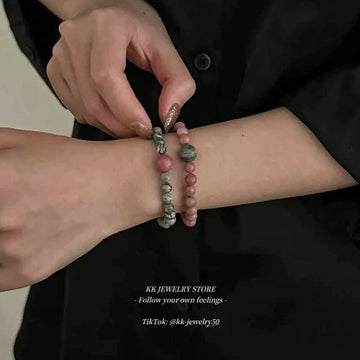 Gray pink natural rosestone map stone bracelet.