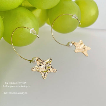 Pentagonal star pearl earrings