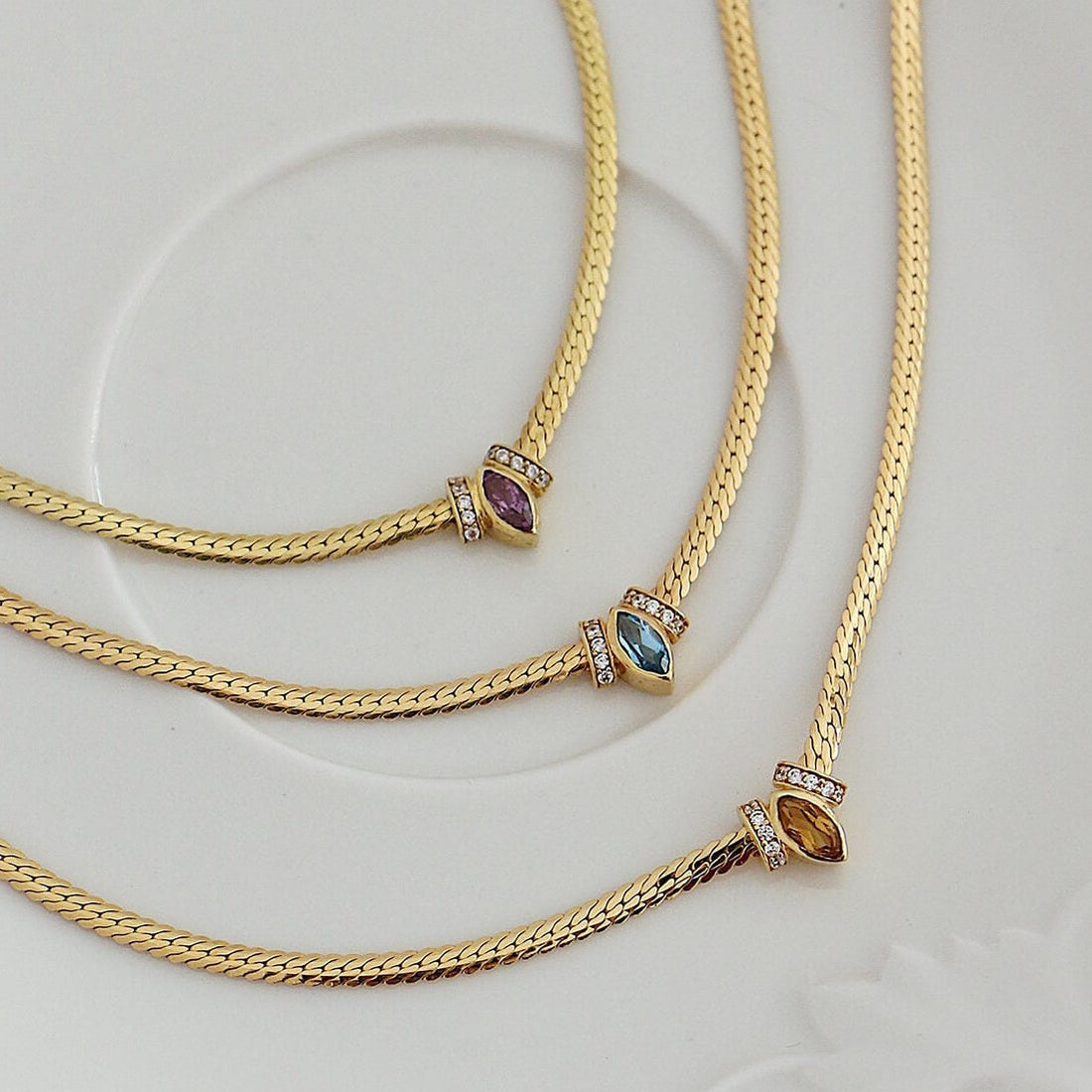 Stainless steel horse eye snake bone necklace