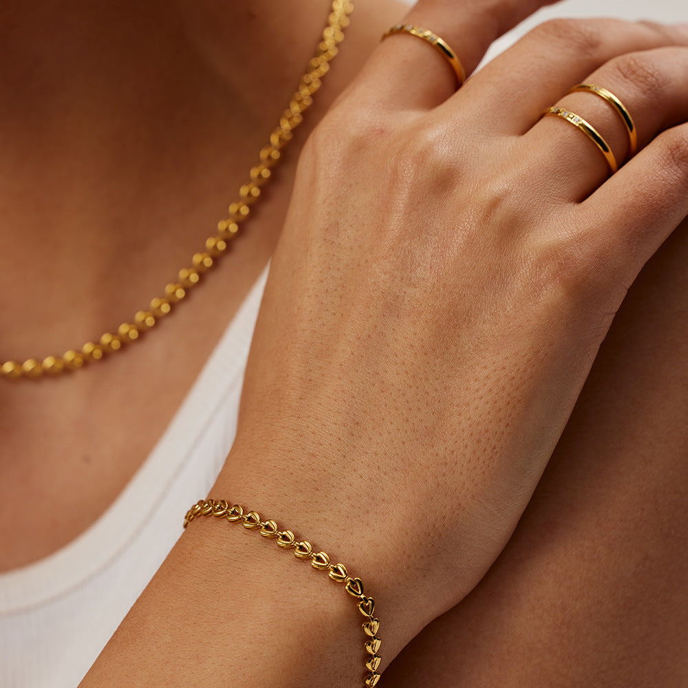 Stainless steel hollow love woven bracelet