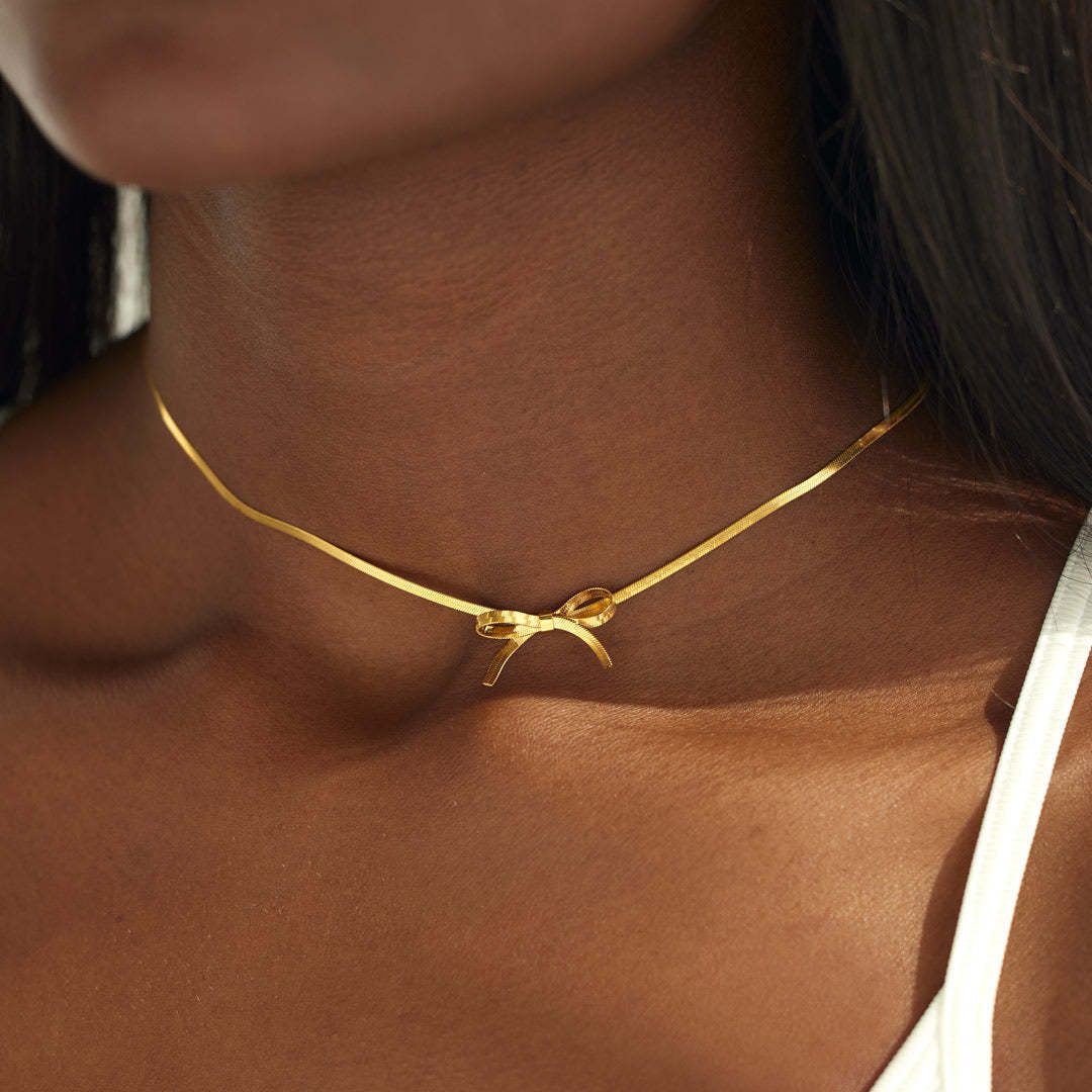 Stainless steel choker bow necklace