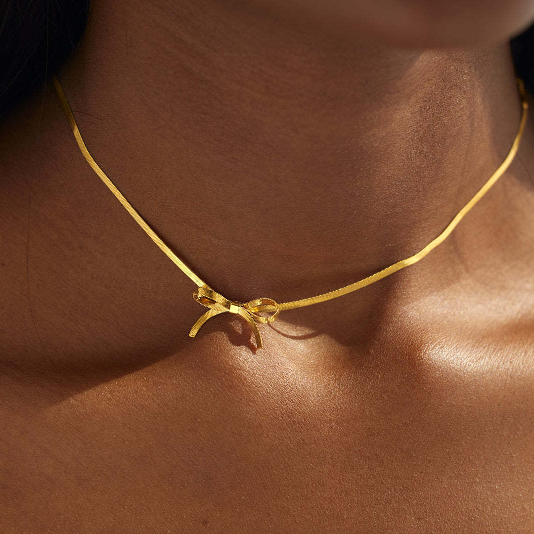 Stainless steel choker bow necklace