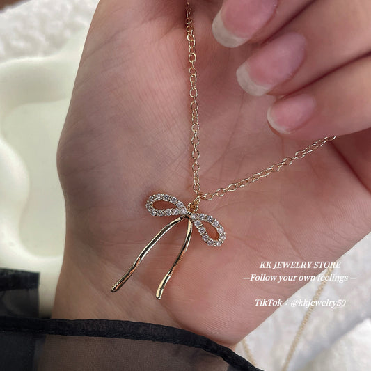 Stainless steel bow necklace