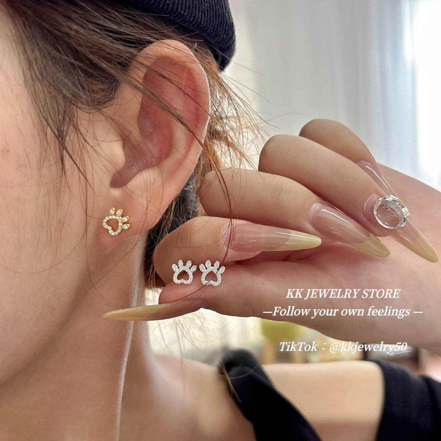 S925 silver hollow cat claw stud earrings