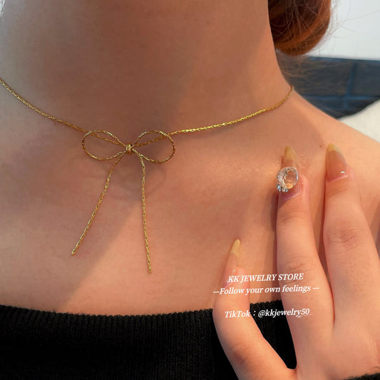 Titanium steel chain bow necklace