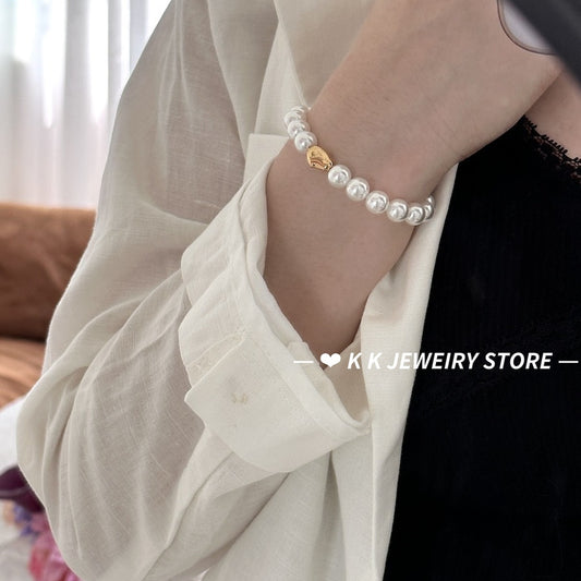 Imitation Australian white faux pearl bungee rope bracelet