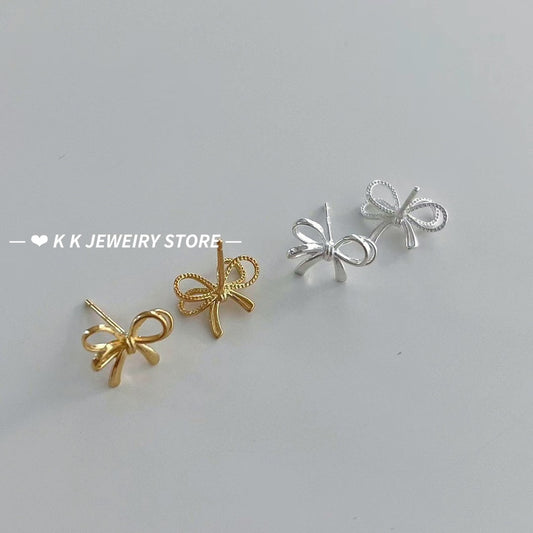 925 silver bow cut-out earrings