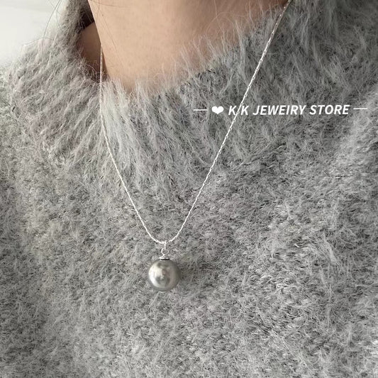 قلادة قلادة واحدة من اللؤلؤة ذات الأبيض الأبيض مغطاة بالفضة الإسترليني