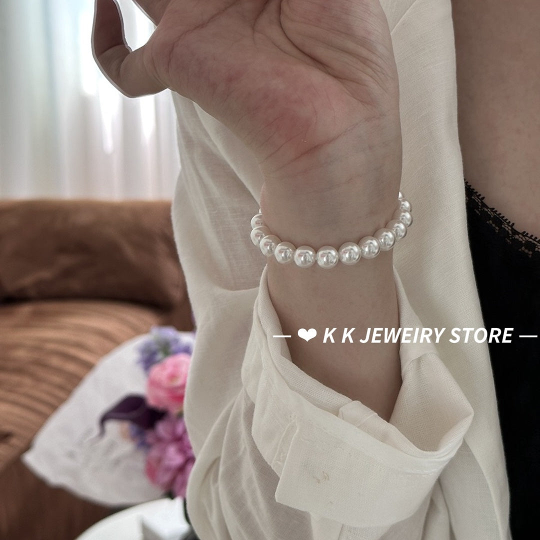 Imitation Australian white faux pearl bungee rope bracelet