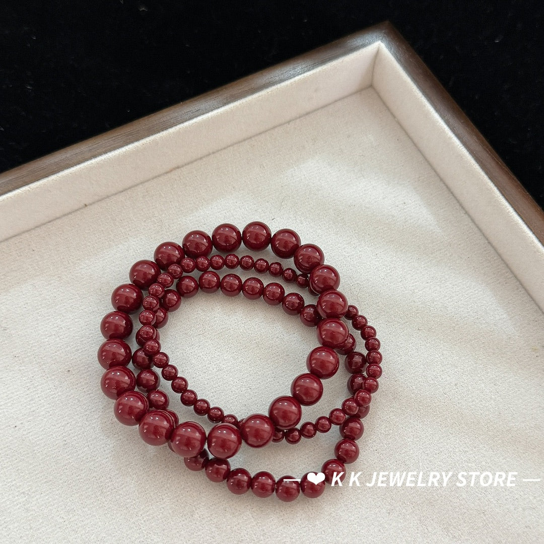 Burgundy faux pearls stacked bracelet