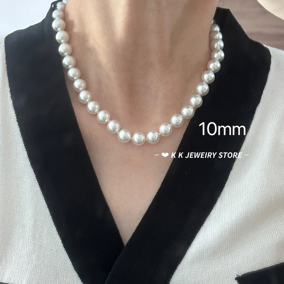 Faux Australian white pearl knotted necklace