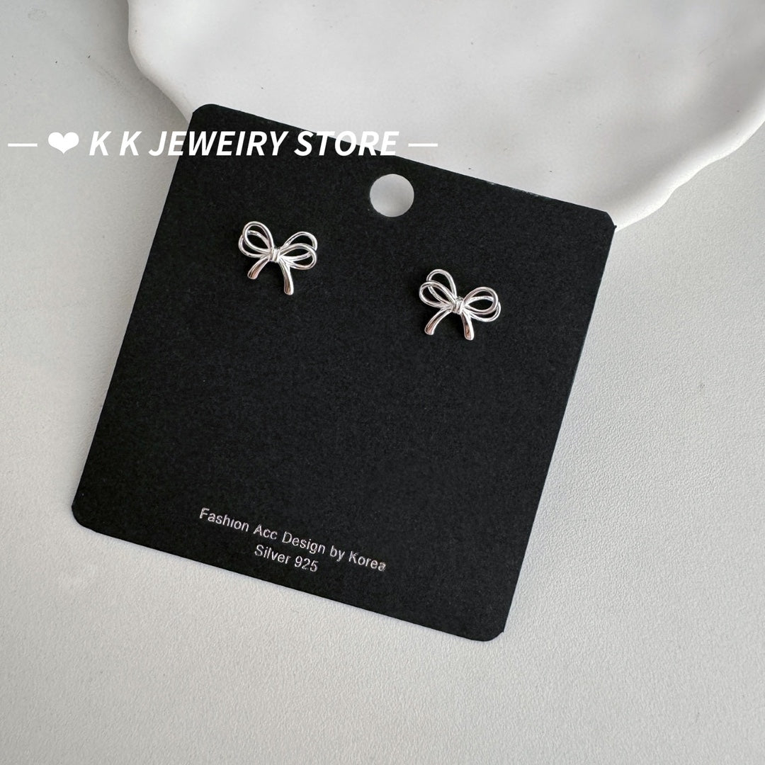 925 silver bow cut-out earrings