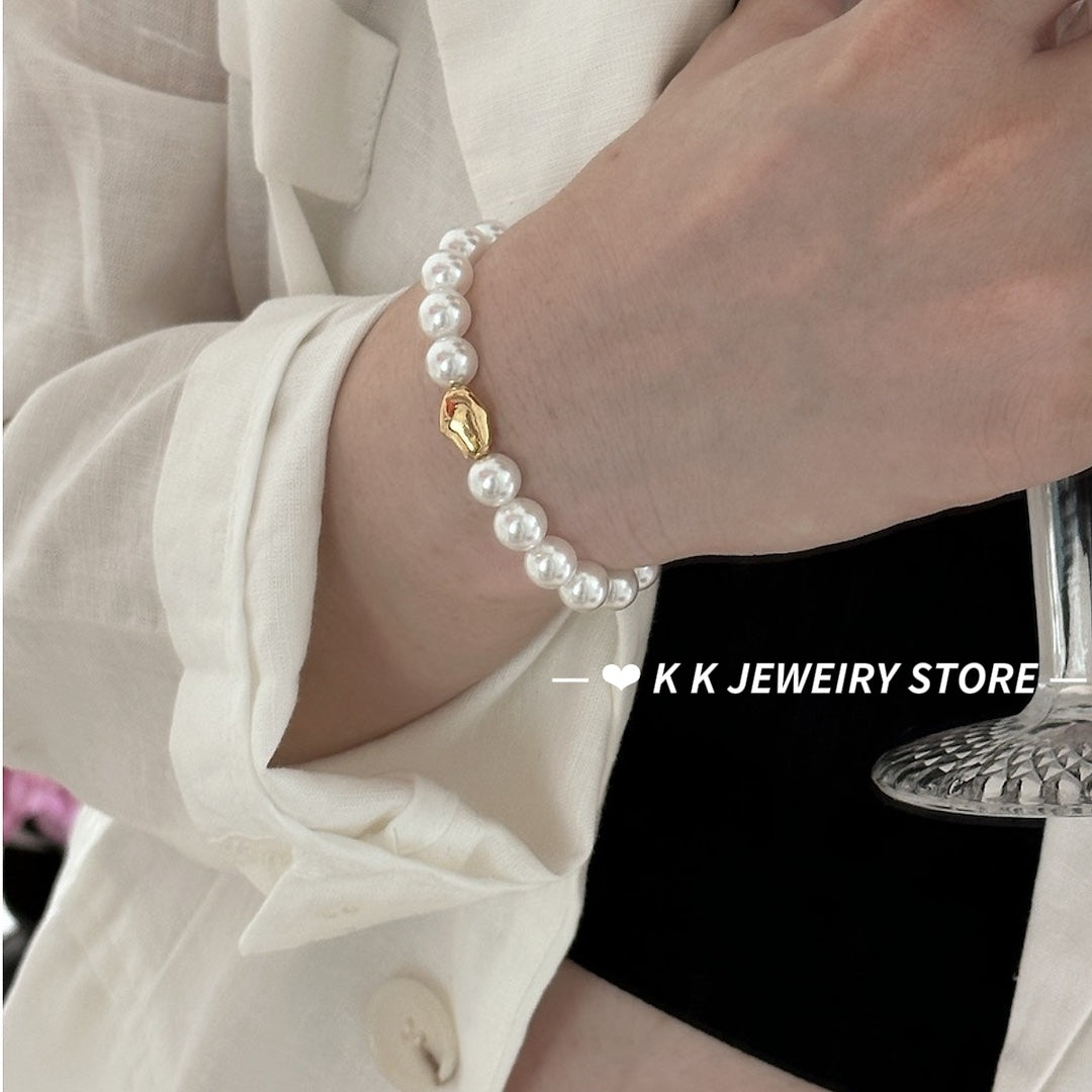 Imitation Australian white faux pearl bungee rope bracelet