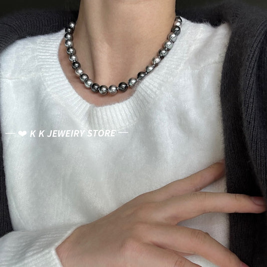 قلادة من اللؤلؤ الرمادي الأخضر الرمادي