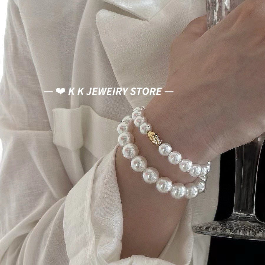 Imitation Australian white faux pearl bungee rope bracelet