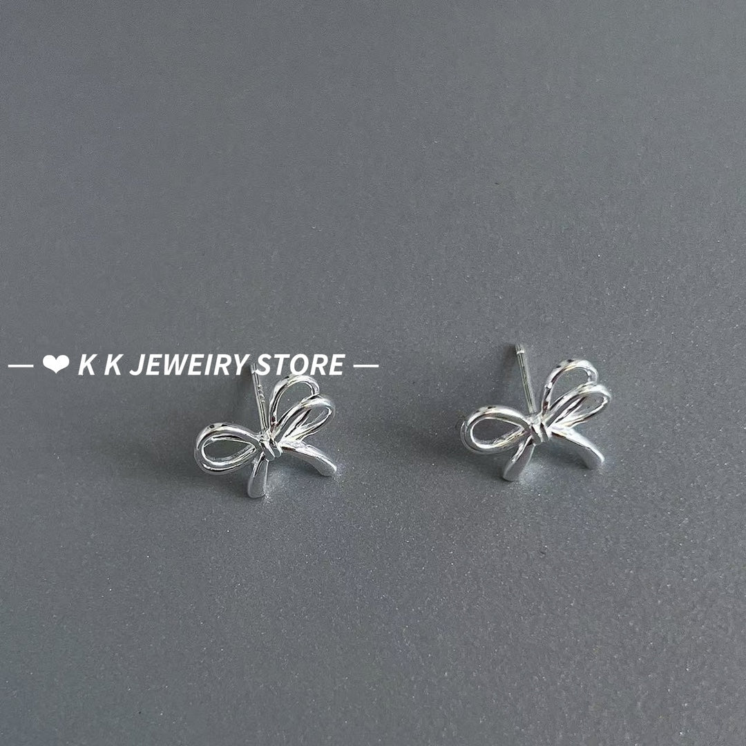 925 silver bow cut-out earrings