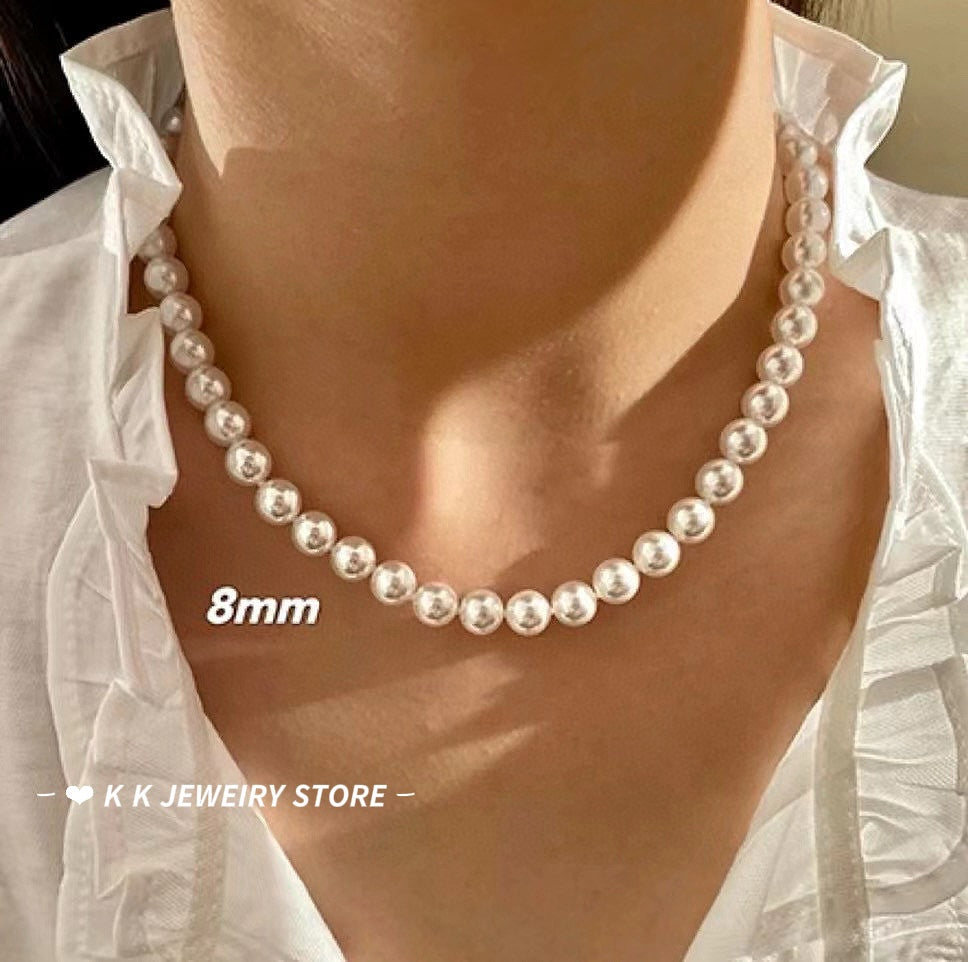 Faux Australian white pearl knotted necklace