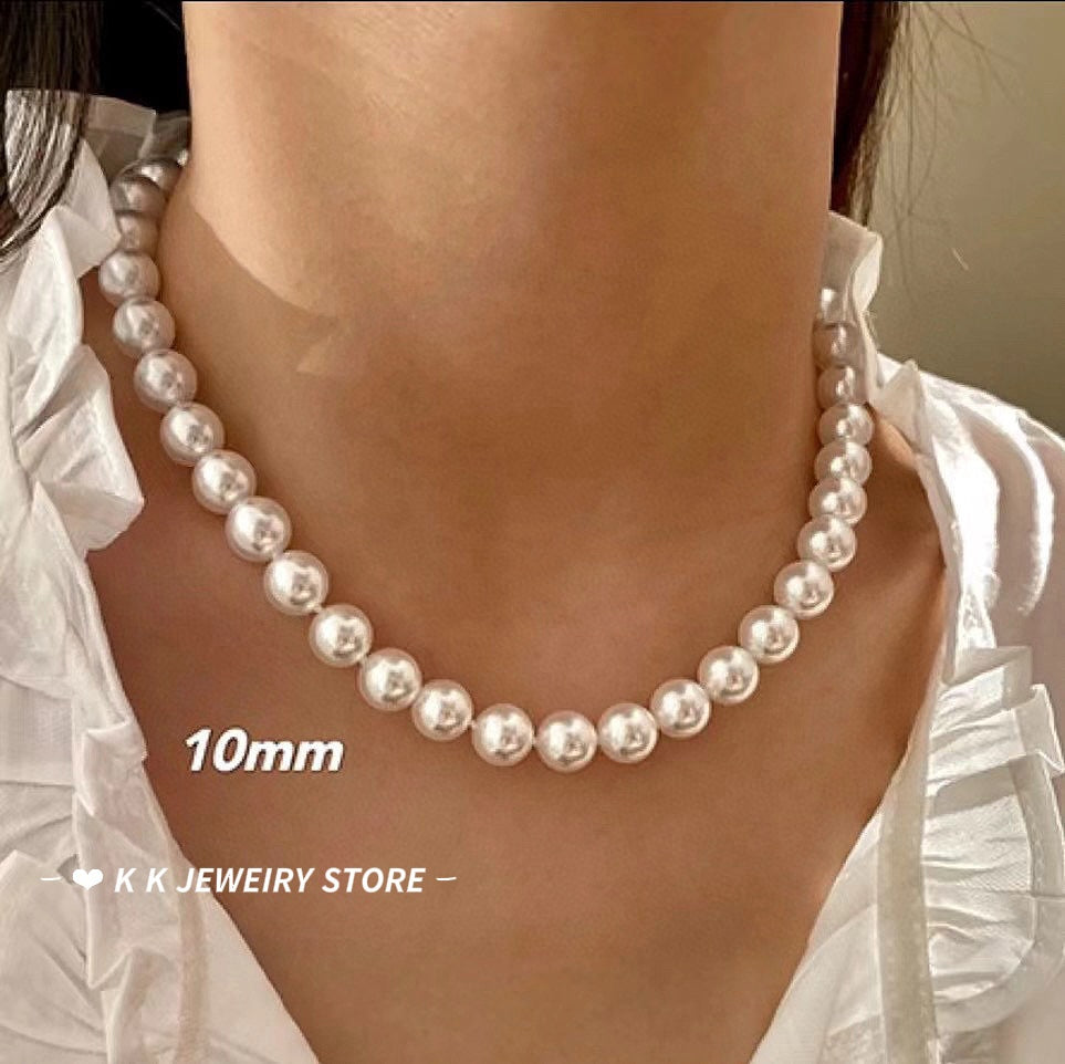 Faux Australian white pearl knotted necklace