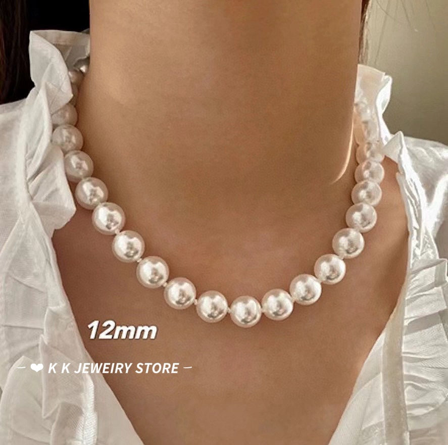 Faux Australian white pearl knotted necklace