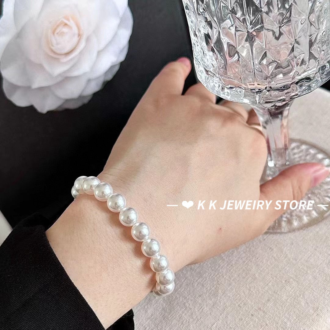 Imitation Australian white faux pearl bungee rope bracelet