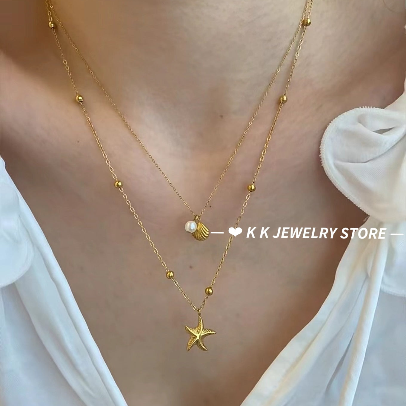 Double-layered starfish shell gold stacking necklace