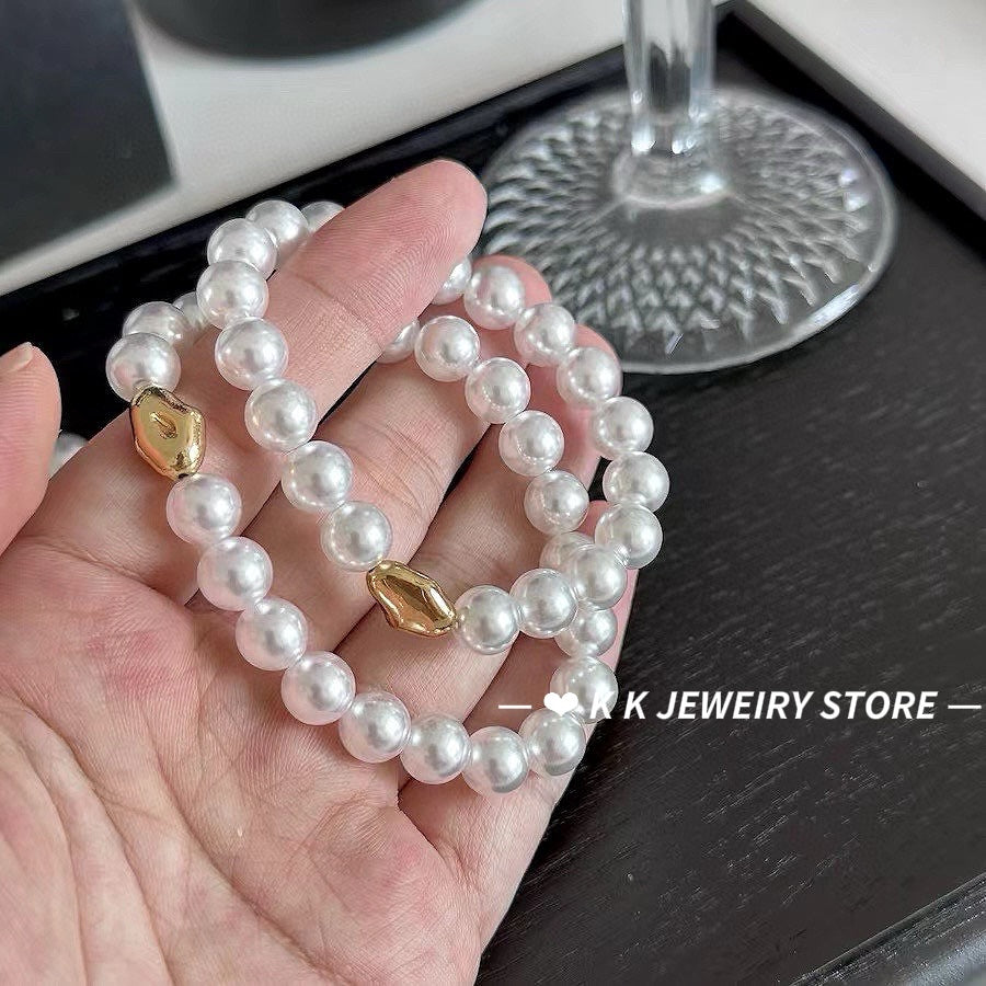 Imitation Australian white faux pearl bungee rope bracelet