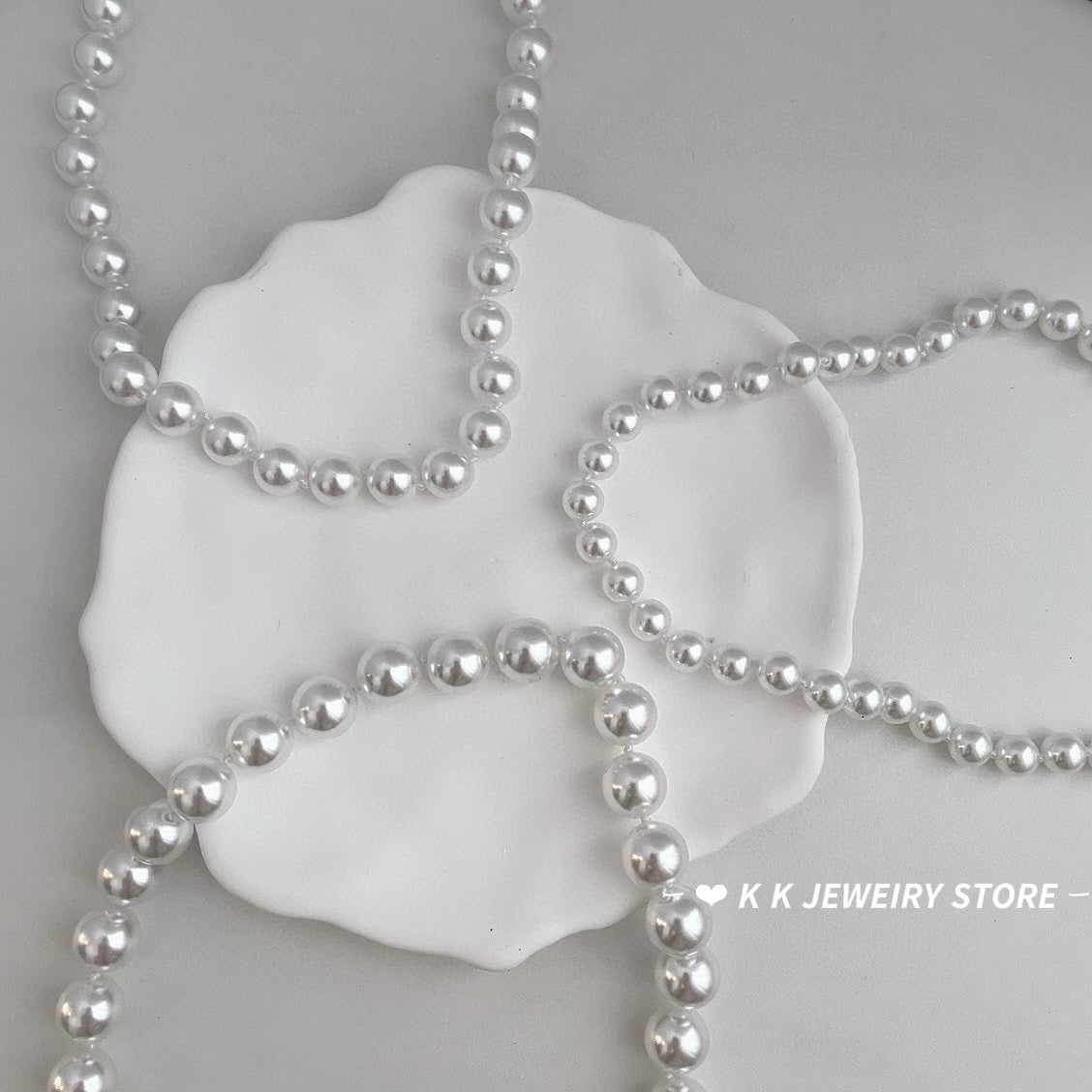 Faux Australian white pearl knotted necklace