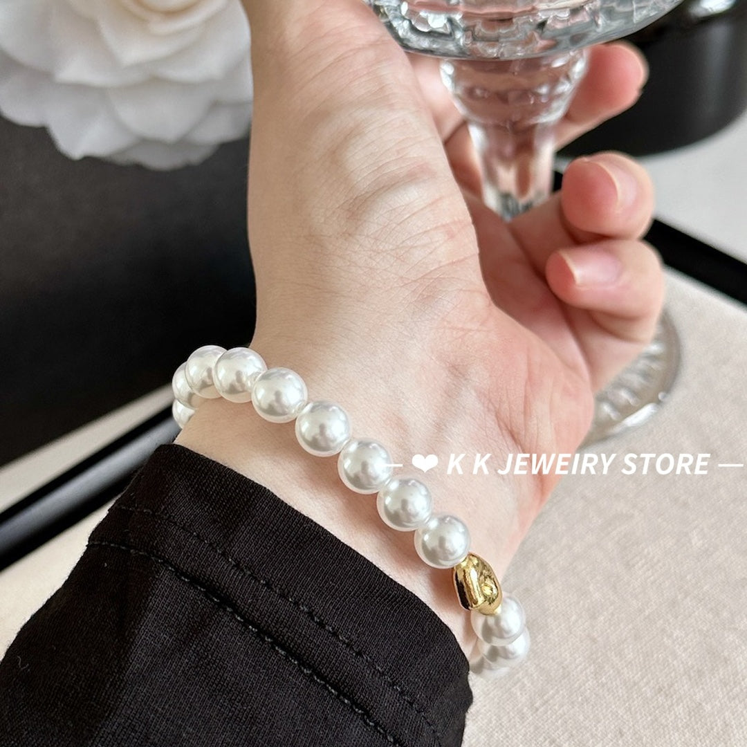 Imitation Australian white faux pearl bungee rope bracelet