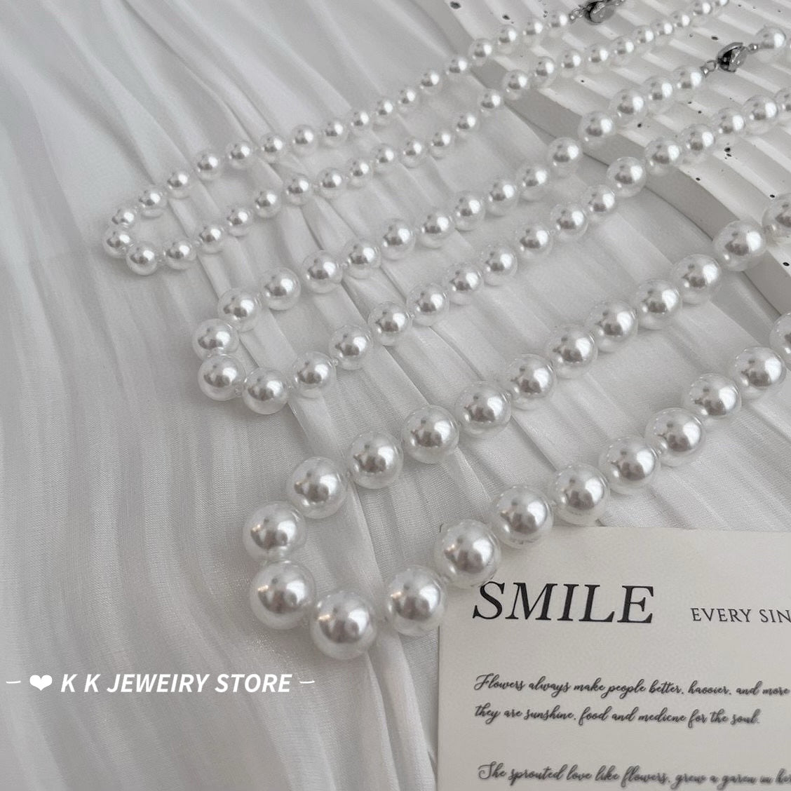 Faux Australian white pearl knotted necklace