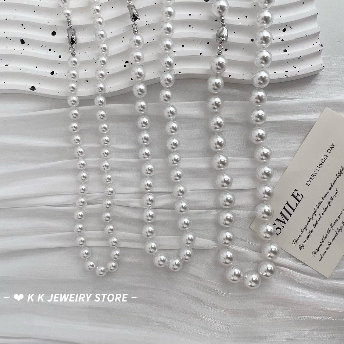 Faux Australian white pearl knotted necklace